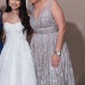 Elegant Silver Gown with Embellished Waist